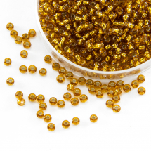Koraliki 17070 Czeski Preciosa 10/0, Przezroczysty z Srebrnym Paskiem TSL, Złoty, Okrągły, 50g (3WB1972)