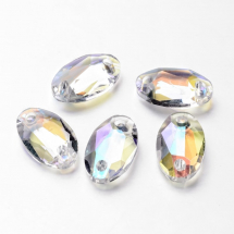 Конектор Овал Скло, Гранований, з Гальванікою, 2 отвори, Колір: Безбарвний, Розмір: 28x17x8мм, Отвір 4мм, (14WB7909)